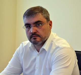 Председатель Совета директоров этого кредитного учреждения Руслан Гусаев